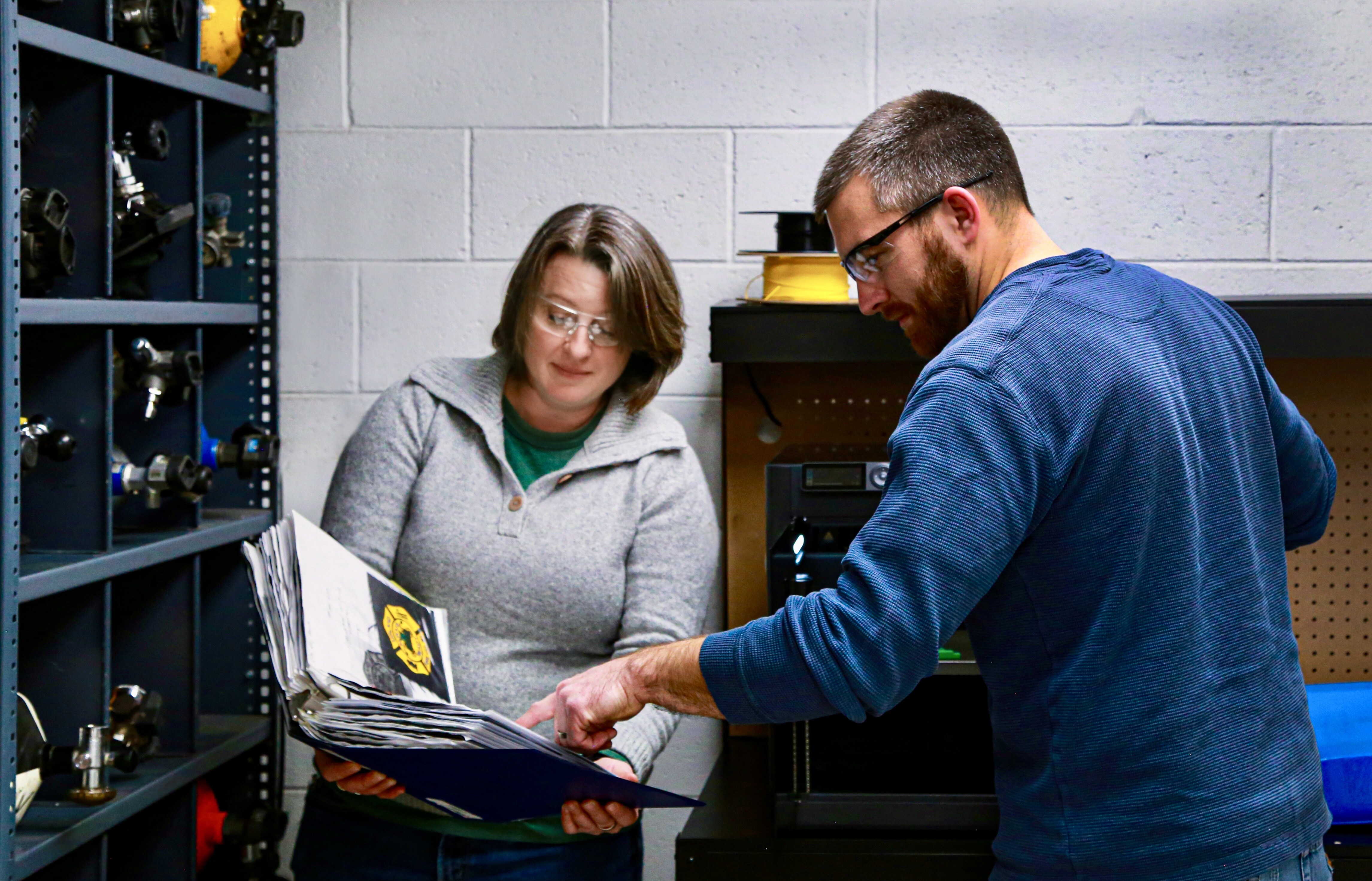 Mitch and Angie engineering at work candid